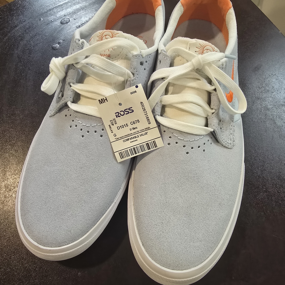 Nike Orange and Blue Sneakers with Versatile Design